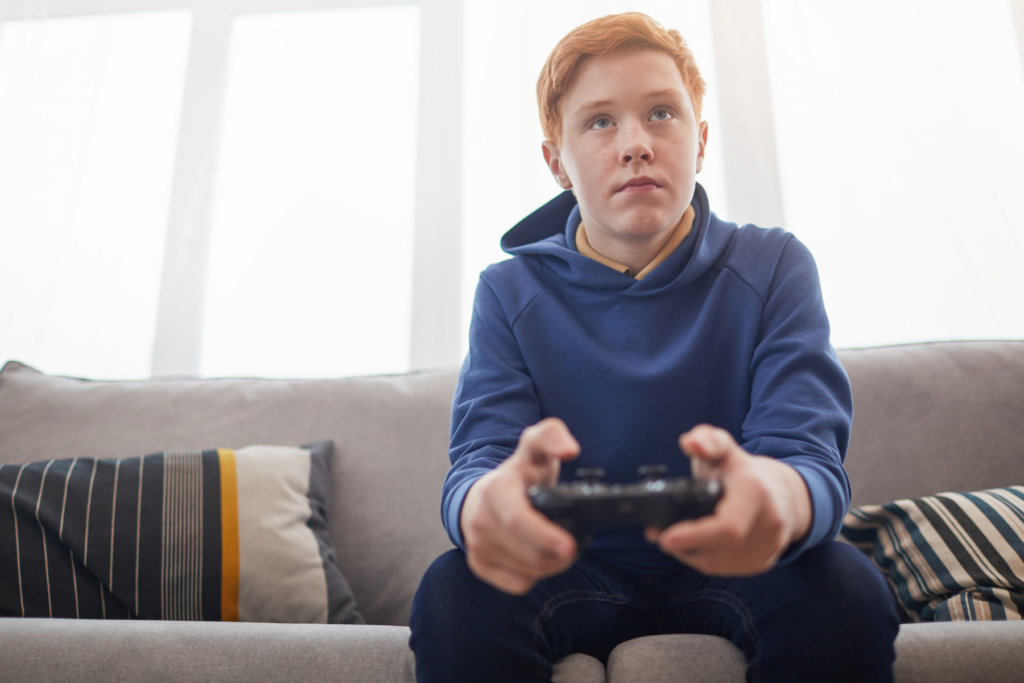 kid and screen playing video games